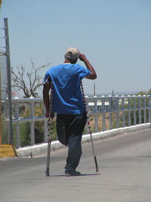 Photo: Beggar at the border